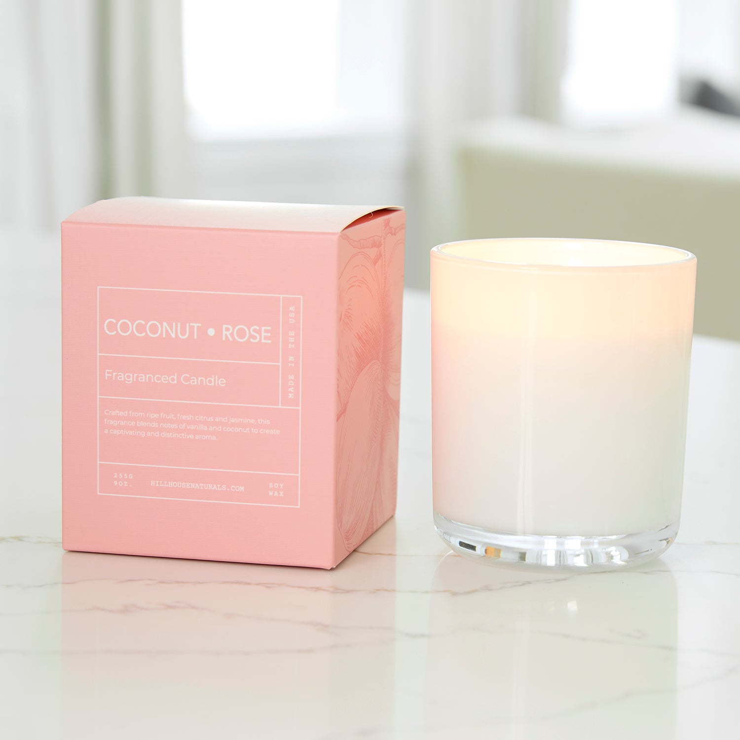 Coconut Rose' candle in white glass in box 9oz.