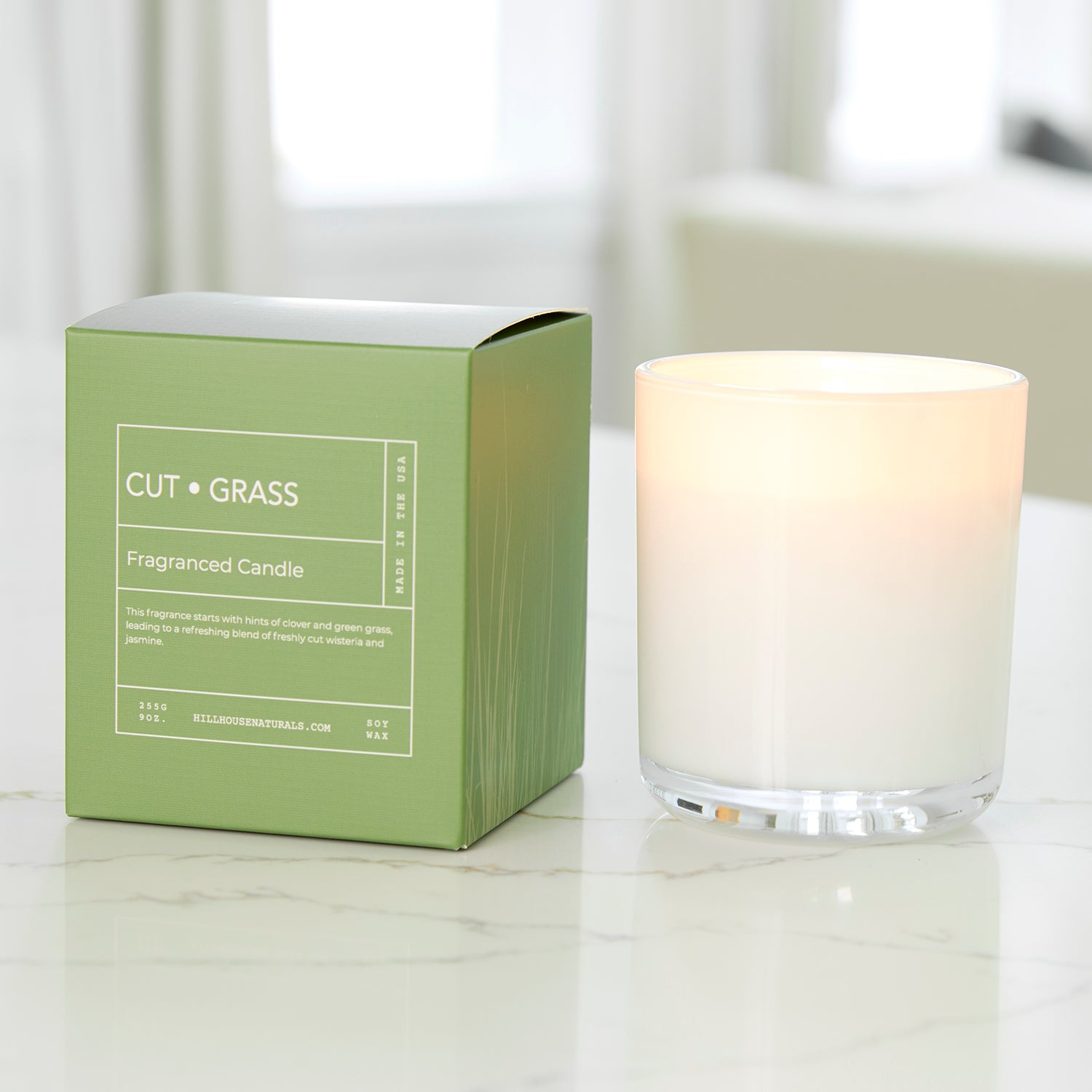Cut Grass candle in white glass in box 9oz.