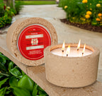 Marigold Citronella candle in concrete pot 32oz.