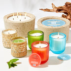 Marigold Citronella candle in concrete pot 32oz.