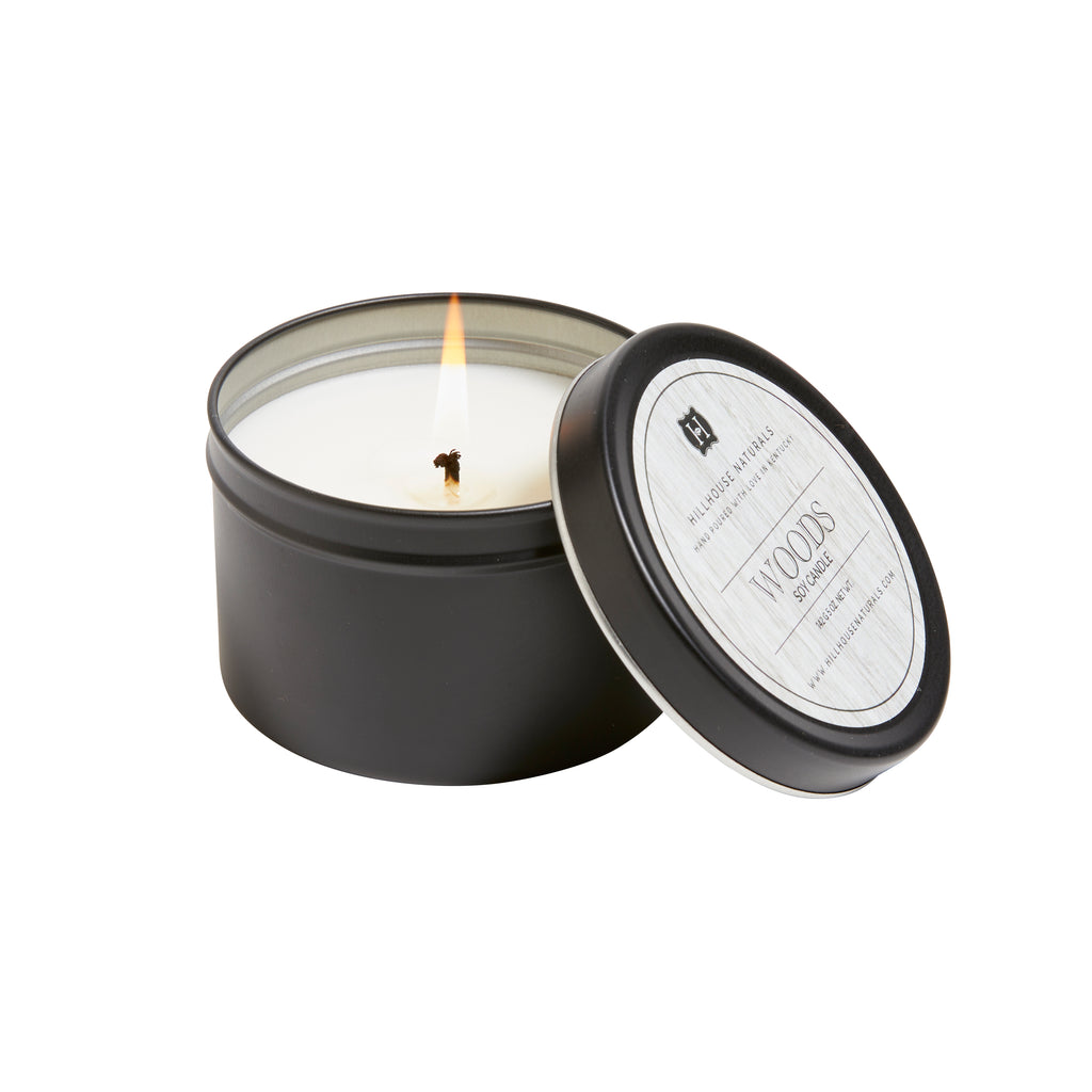 Woods candle in black tin 5oz.