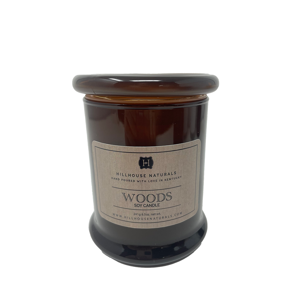 Woods candle in brown jar w/glass lid 8.5oz.