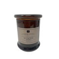 Woods candle in brown jar w/glass lid 8.5oz.