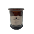 Woods candle in brown jar w/glass lid 8.5oz.