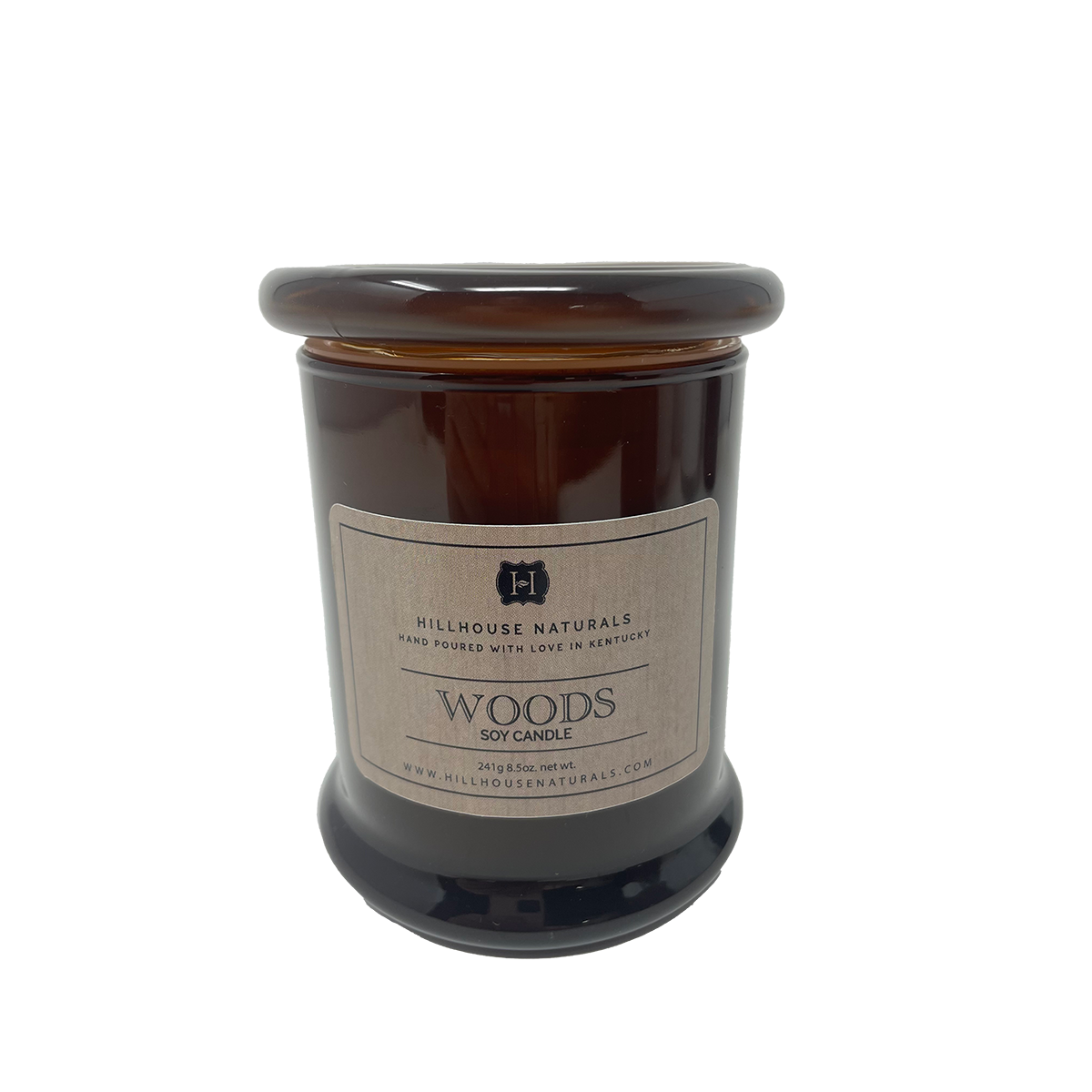 Woods candle in brown jar w/glass lid 8.5oz.