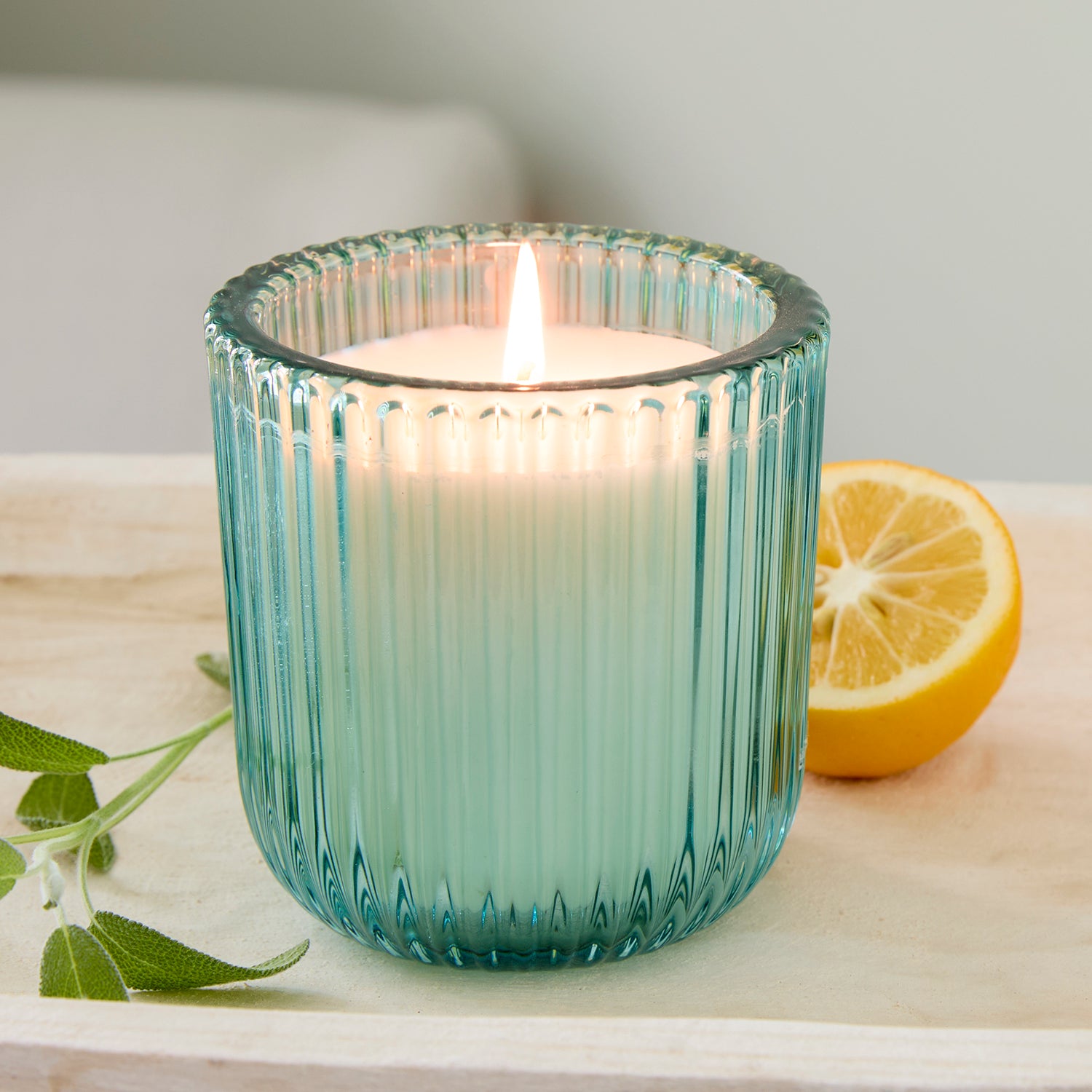 Yuzu Sage 1 wick candle in colored glass 8oz.