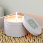 Yuzu Sage candle in white tin 6oz.